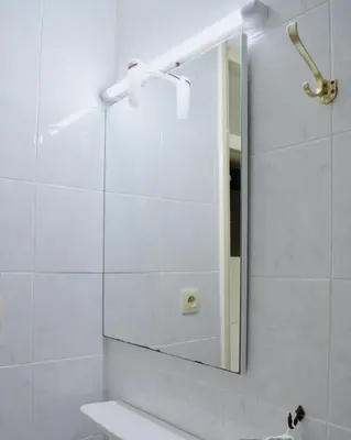 a bathroom with a shower with a mirror at Calme et verdure 9 in La Calamine