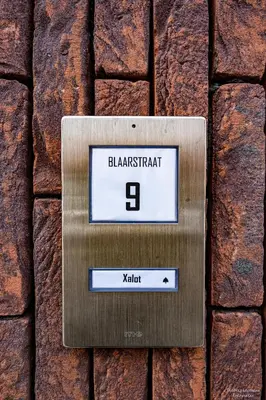a lightswitch on a brick wall at Vakantiewoning Xalot in Tongeren