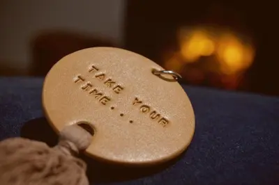 a key chain with the words this house isours at Sweet Valley Madeleine in Zutendaal