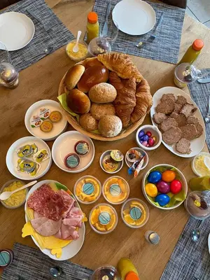 a table with a bunch of food on it at SINTPIETER18 @Lo-Ghis vakantiewoning in Voeren