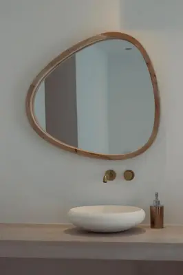 a bathroom sink with a mirror on a counter at Casa Honey in Liège