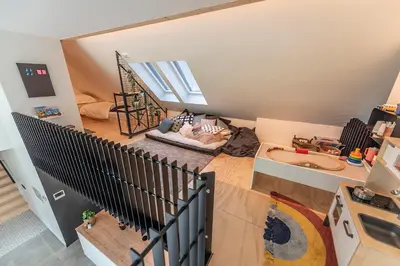 an overhead view of a living room with a staircase at In't Groene Woud in Peer