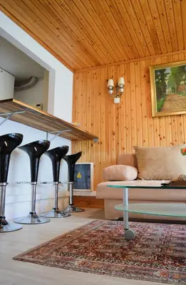a living room with a couch and a table at Oasis Verte in La Calamine
