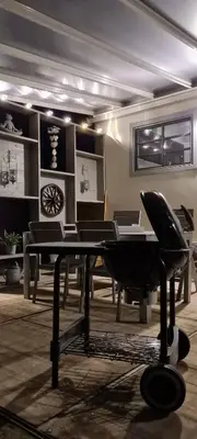 a room with a table with a piano in it at Tijd voor jezelf en elkaar bij Me&We in Zutendaal