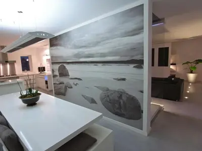 a living room with a large painting on the wall at B&B Bianero in Peer