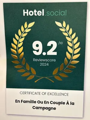 a ticket for a hotel with a laurelreath on it at Guest House en famille ou en couple à la campagne in Romsée