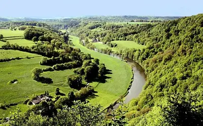 an aerial view of a river in a field at La douce Rive in Esneux