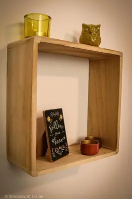 a wooden shelf with a book and a glass at De Millenniumhoeve (Willy) in Riemst