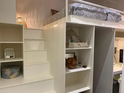 a white book shelf in a room at Le Pavillon de Flore by Maison Brasseurs d'Etoiles - Appartement 2 personnes in Liège
