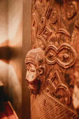 a statue of a head on a wall at Ô Secret in Liège