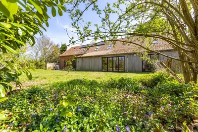 an image of a house with a garden at Villa Vigor in Peer