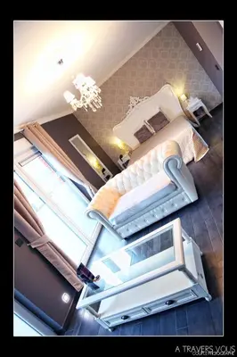 an overhead view of a bedroom with two beds at V E R O N E - Rooms & Suites - Liège - Rocourt in Liège
