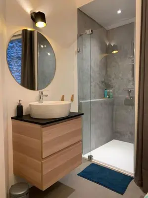 a bathroom with a sink and a shower at Mr White's in Liège
