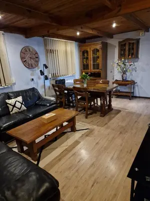 a living room with a couch and a table at mignon in Soumagne