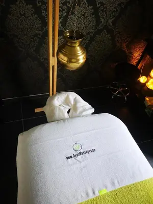 a white towel sitting on top of a table at Nimary Logies in Heusden - Zolder