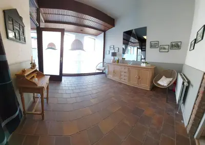 a large bathroom with a sink and a mirror at Le Pepin Dort in Pepinster
