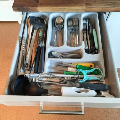 a drawer filled with utensils and utensils at Studio Klimt Eupen in Eupen