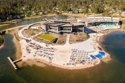 an aerial view of a resort in the water at Terhills Resort by Center Parcs in Dilsen-Stokkem