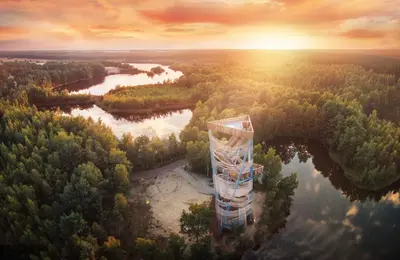 an aerial view of a tower in the water at Guesthouse 66 in Lommel