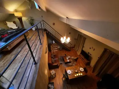 an overhead view of a living room with a loft at Le Clos des Thermes in Chaudfontaine