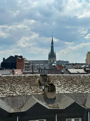 a view of a city from the roof of a building at L’émeraude in Liège