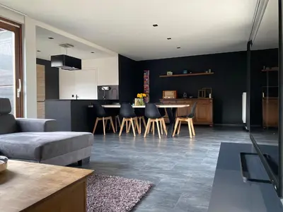 a living room with a couch and a table at Casper House, Near Maastricht in Lanaken